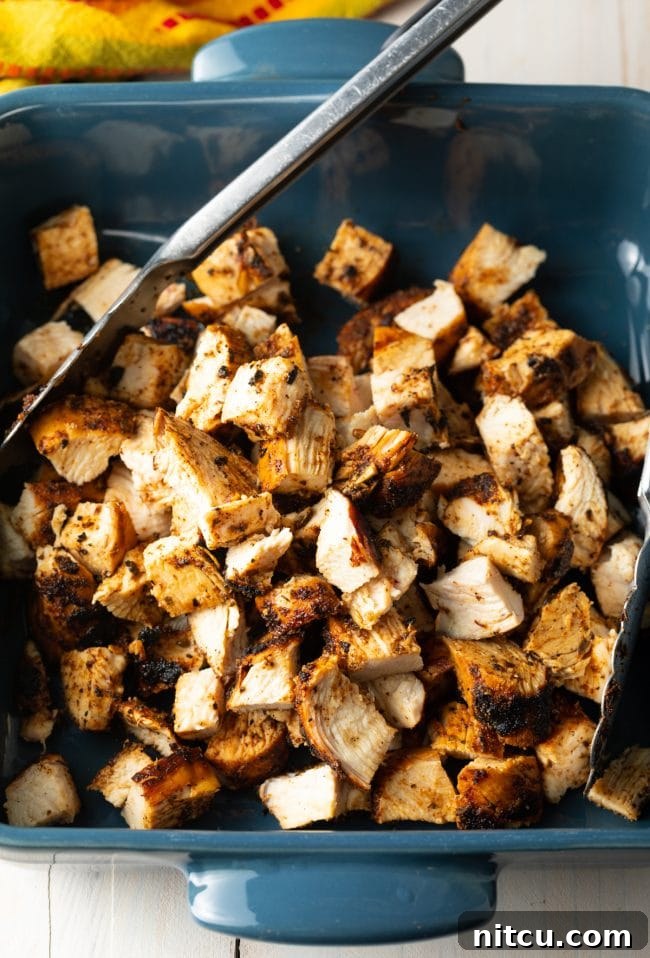 Homemade Chipotle Meal Prep Bowls 8 Close-up of perfectly chopped chipotle grilled chicken, ready for assembly.