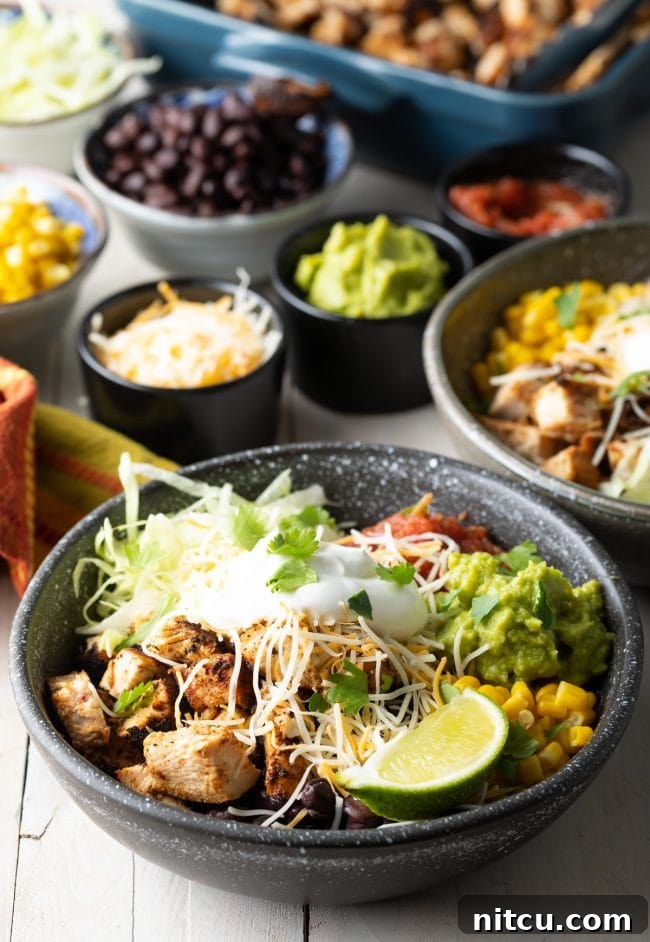Homemade Chipotle Meal Prep Bowls 10 A fully assembled Chipotle Chicken Burrito Bowl, brimming with grilled chicken, rice, beans, corn, and all the fresh toppings.