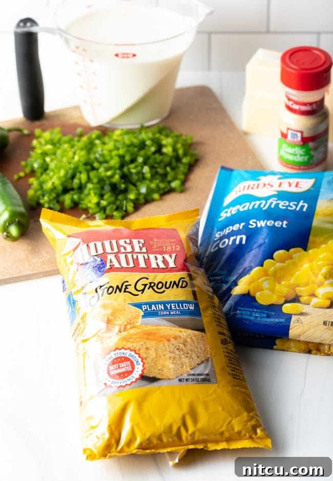 Zesty Jalapeno Cheddar Cornbread 6 Recipe ingredients laid out, including corn and chopped peppers on a cutting board, ready for mixing.