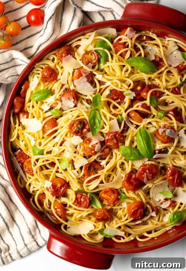Oven-Kissed Cherry Tomatoes 11 A large pot of perfectly cooked spaghetti coated in a rich, homemade roasted cherry tomato sauce.