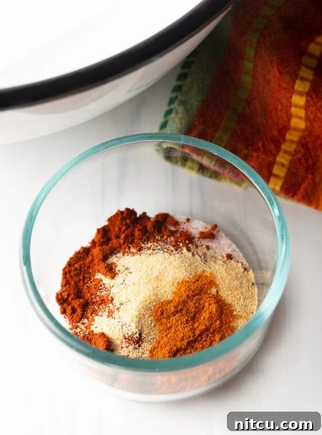 Fiesta Potatoes 7 Small glass bowl containing a vibrant mix of Patatas Bravas spices