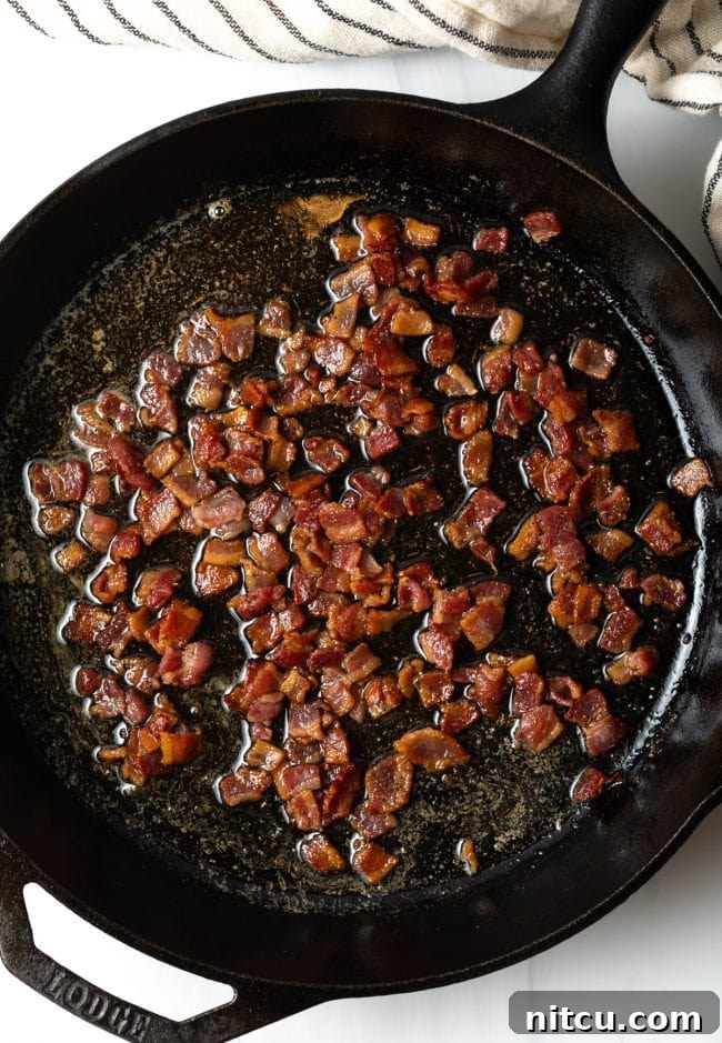 Sad Greens 6 skillet with chopped cooked bacon
