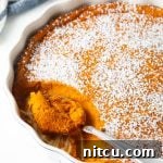 Golden Carrot Cloud 11 A delicious Carrot Souffle Casserole, garnished with powdered sugar.