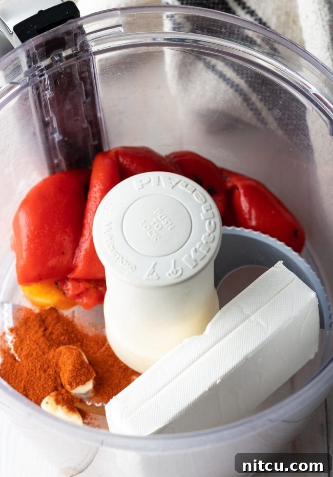Roasted-Red-Pepper-Spread Roasted red peppers, cream cheese and spices in a food processor.