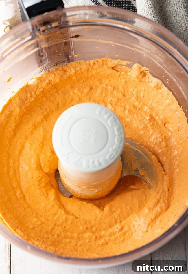 Easy-Roasted-Red-Pepper-Sauce Roasted red pepper sauce in a food processor.