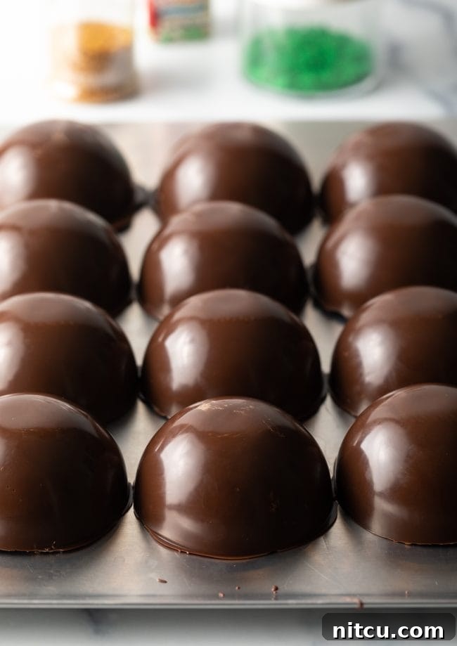 Magical Melting Cocoa 8 Ready chocolate half spheres removed from mold.