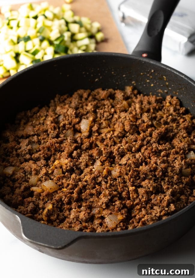Savory No Rice Keto Beef Stuffed Peppers 5 Skillet of browned crumbled ground beef.