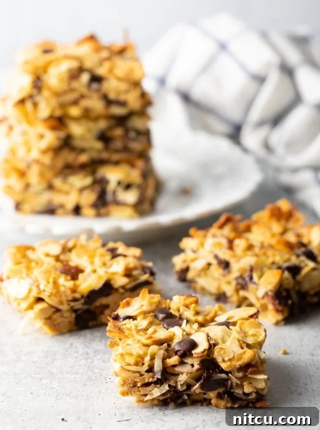 Stacks of perfectly cut keto cereal snack bars, ready for serving.