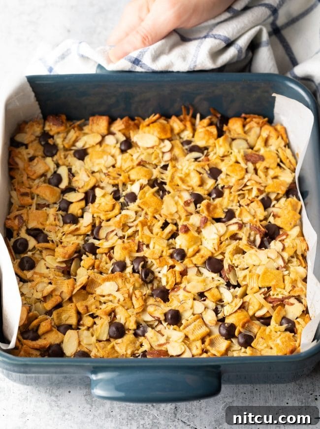 Top view of baking pan with the keto cereal mixture baking in the oven.