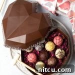 A small image showing the breakable chocolate heart, indicating it's the recipe's final product.