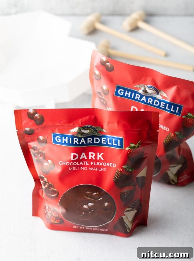 Crackable Chocolate Treasure 4 Two bags of premium Ghirardelli dark chocolate melting wafers are neatly displayed, ready to be transformed into a delicious breakable heart.
