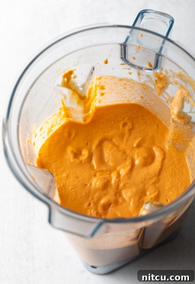 Authentic West African Maafe Peanut Stew 7 The blended ingredients, now a smooth, creamy purée, inside the blender.