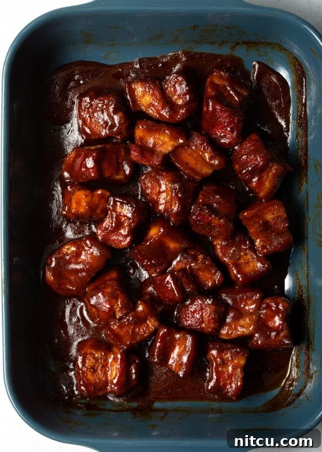 BBQ Pork Belly Candy Bites 9 Oven roasted pork belly burnt ends, sticky and caramelized.