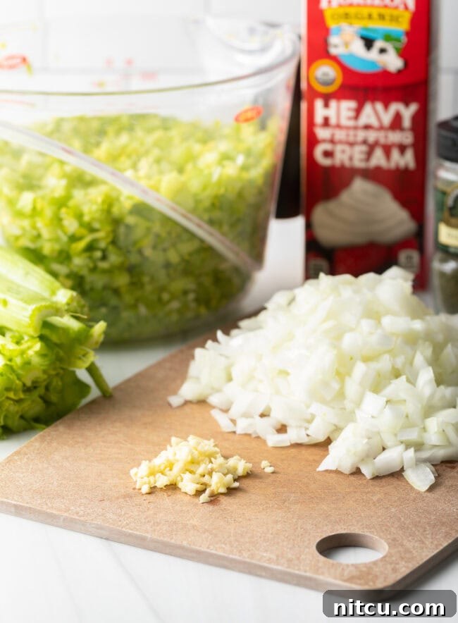 chopped garlic and onion on board