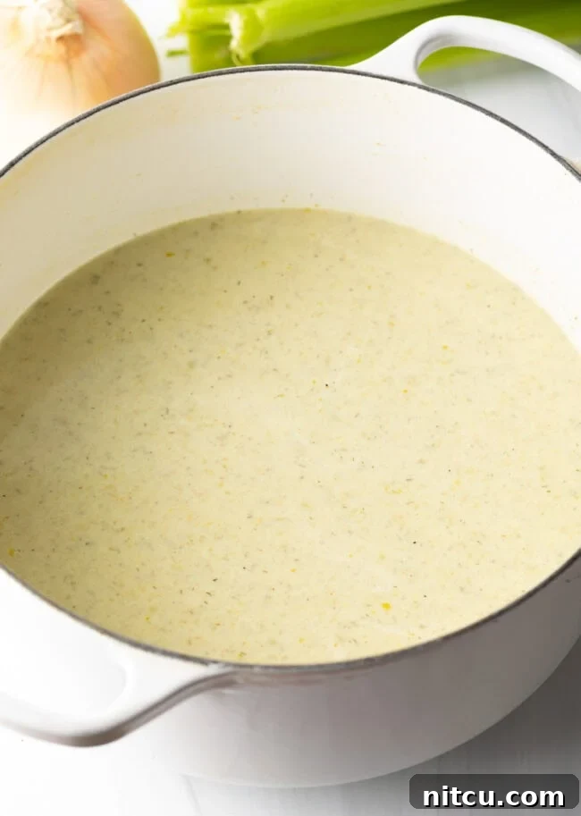 Cream of Celery Soup added back to pot, combined with heavy cream.