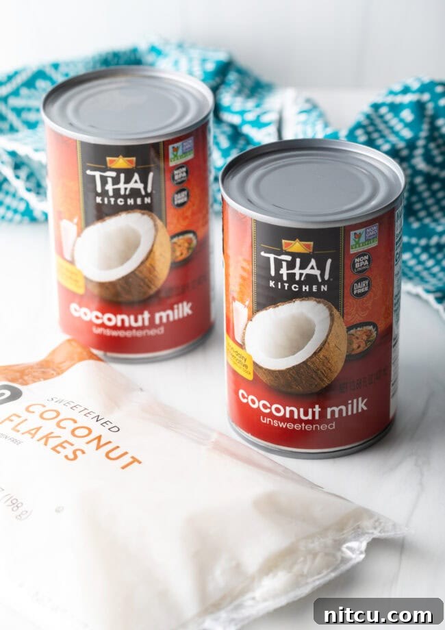 Creamy Dairy-Free Coconut Popsicles 4 Two cans of unsweetened full-fat coconut milk, the key ingredient for creamy dairy-free popsicles.