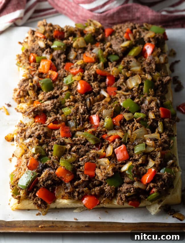 Philly Cheesesteak Bites 10 Steak and pepper mixture on the bottom rolls.