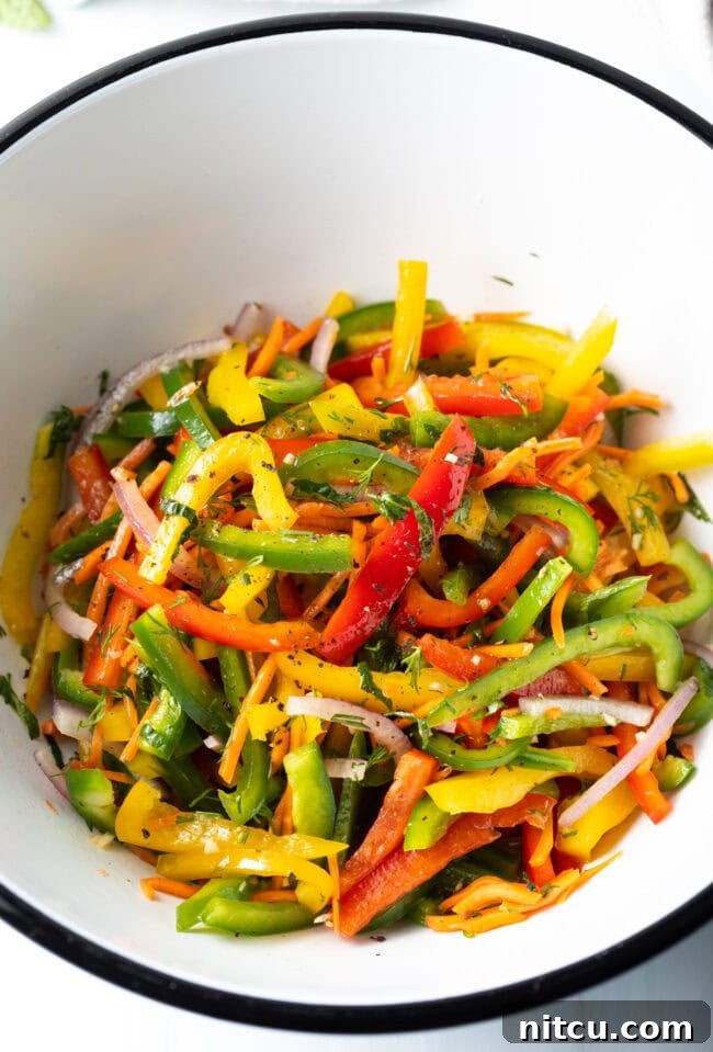 Roasted Pepper Medley 5 Close-up of a vibrant bell pepper salad, highlighting the crisp textures and fresh herbs, ready to be enjoyed.