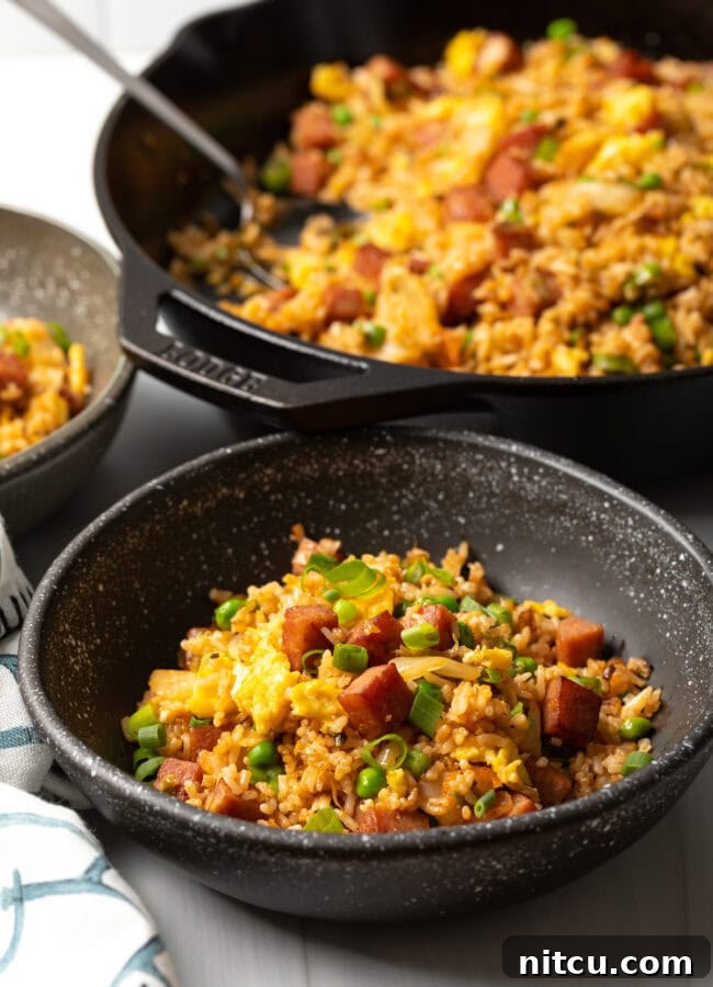 Tropical Kimchi Fried Rice 10 Bowl of spam and kimchi Hawaiian fried rice final recipe photo.