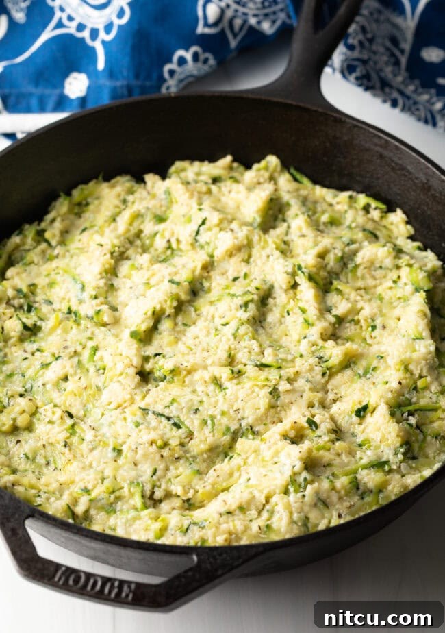 Golden Zucchini Gratin 8 Combination of ingredients smoothed into an even layer in the cast iron skillet.