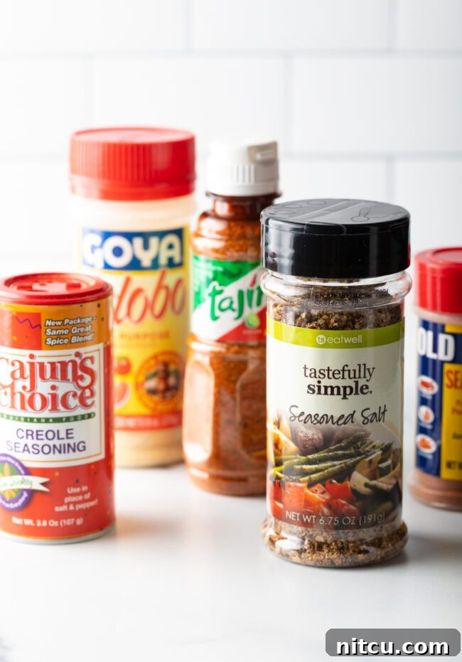 Bottles of different spice options for tater tot seasoning.