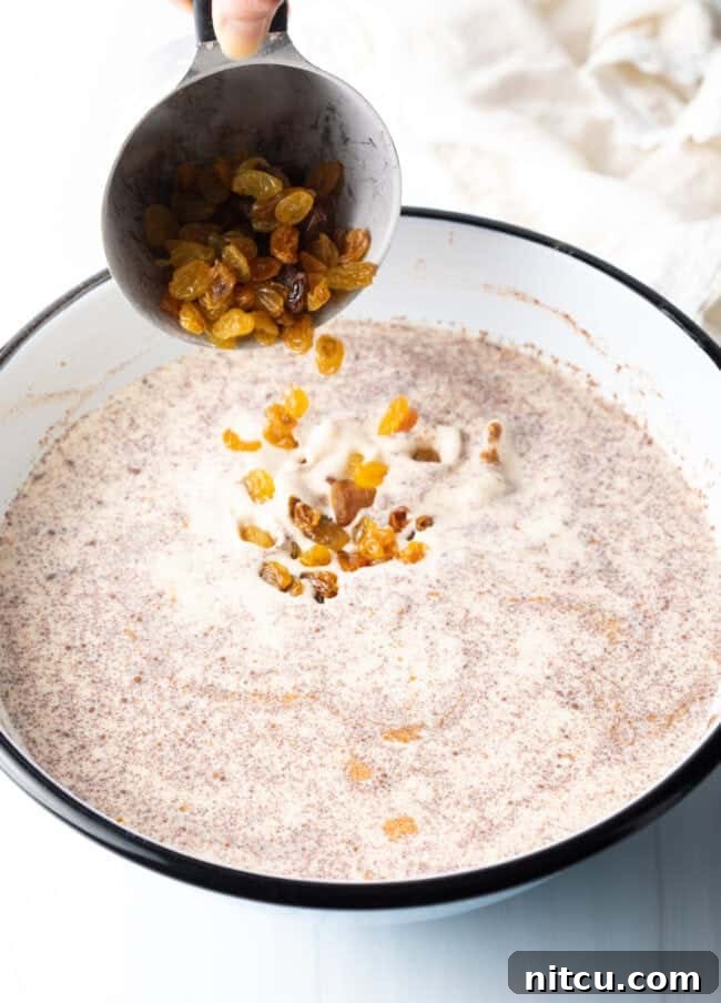 Golden Baked Rice Pudding 8 Sprinkling golden raisins into the rich rice and cream mixture, adding sweet bursts of fruit.