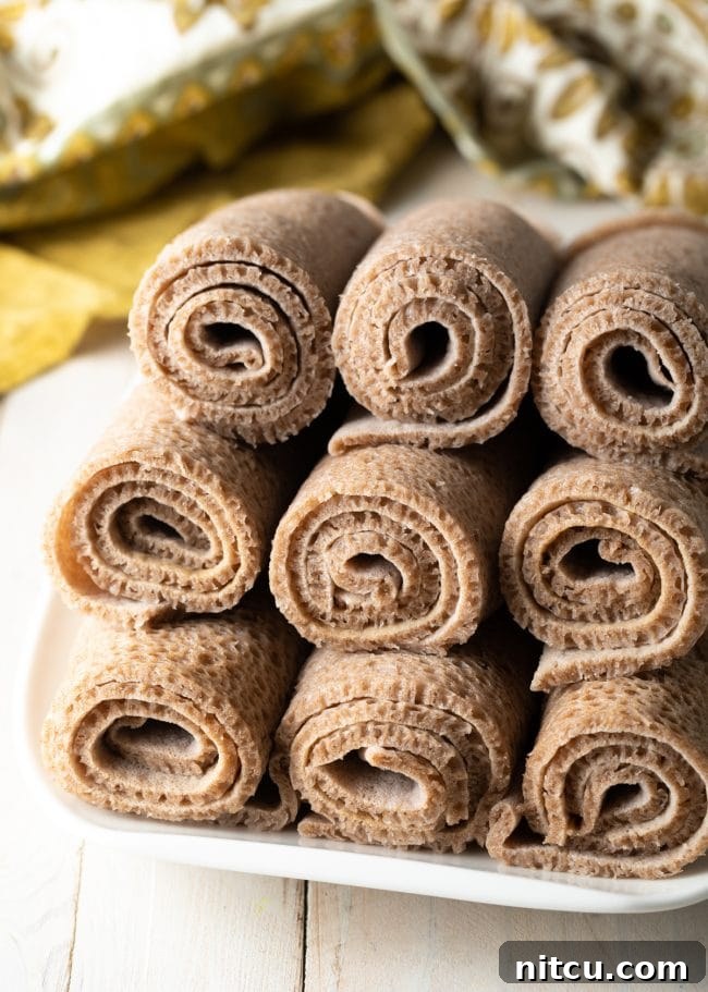 Rolled up Ethiopian bread stacked on a platter. 