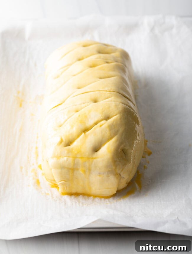 Beef tenderloin wrapped in final layer of puff pastry. 