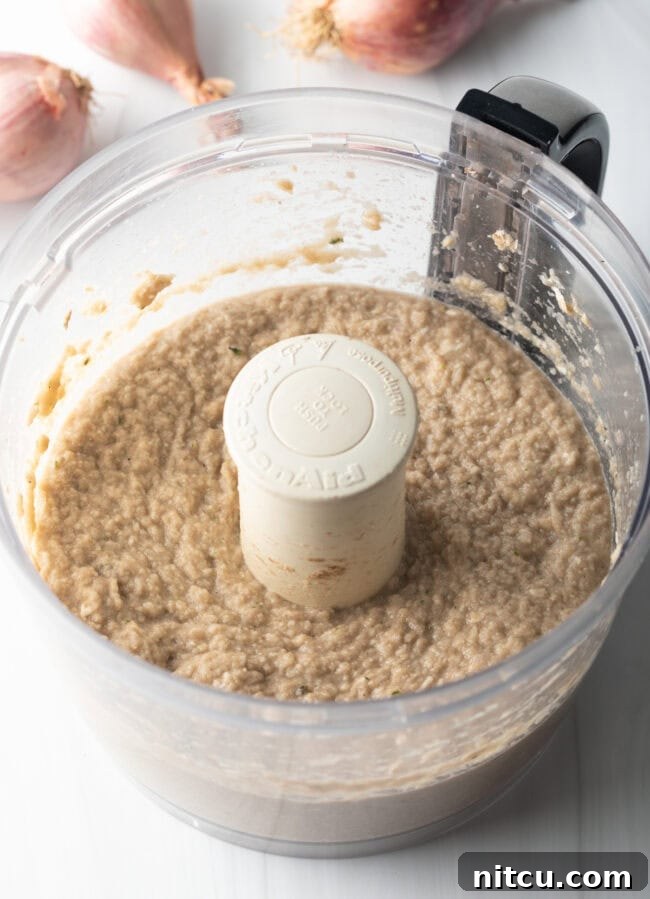 Pureed Duexulles in a food processor.