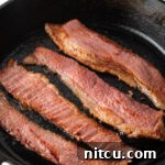 Cooked beef bacon strips