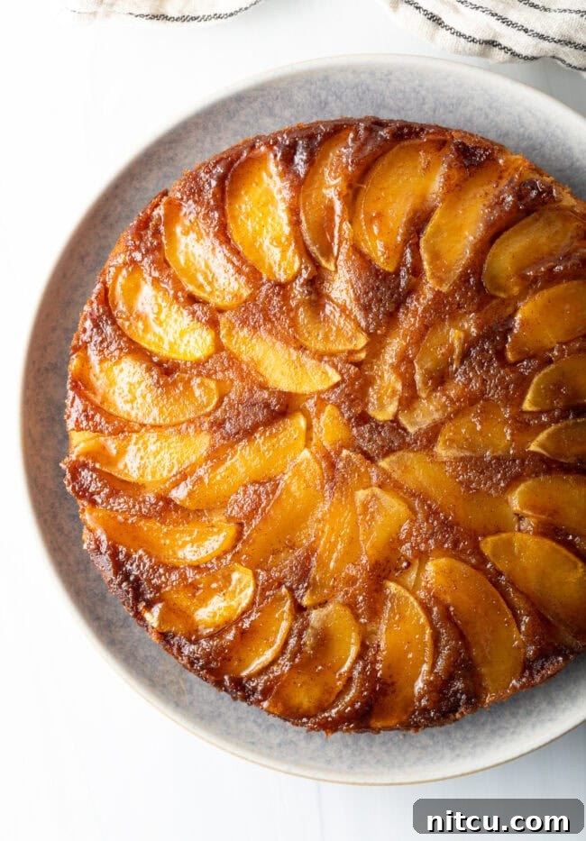 Effortless Apple Caramel Flip Cake 3 Top down apple upside down cake on a platter.