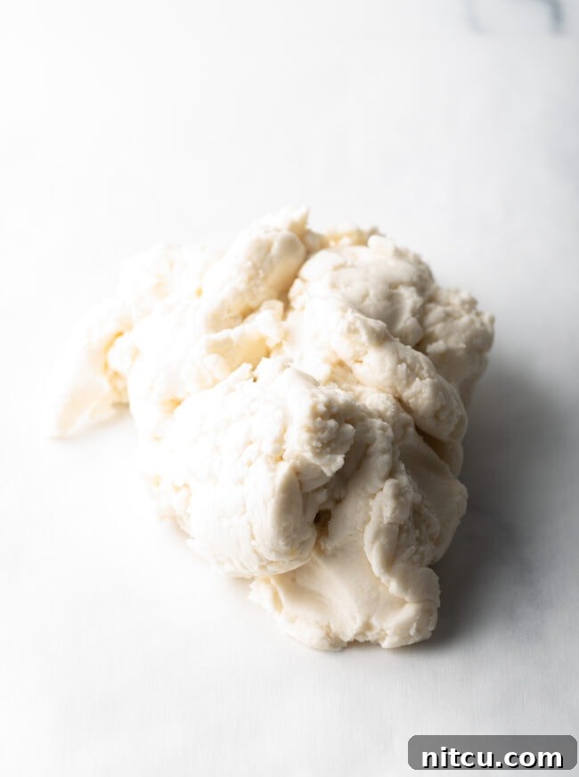 Spudnut Delights 8 Loose pile of mash for candy on a white background.