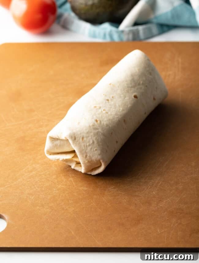 Your New Favorite Chicken Wrap 10 Tortilla rolled into a burrito-like wrap.