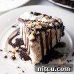 Island Sunset Pie 17 Slice of chocolate Duke's Hula Pie on a white plate.