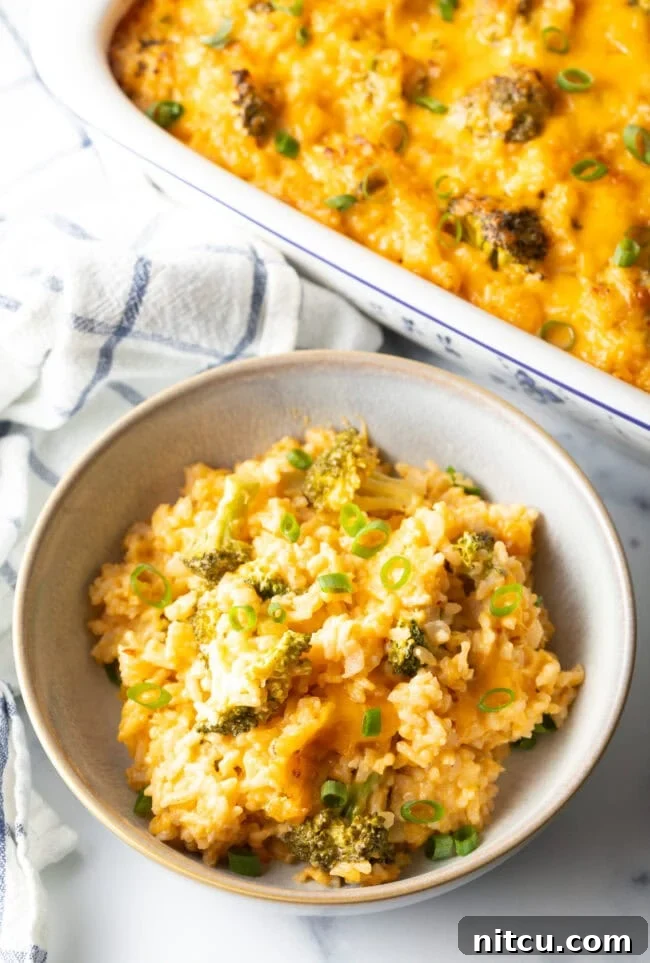 Effortless Cheesy Broccoli Rice Bake 10 Bowl of broccoli, rice, and cheese casserole.