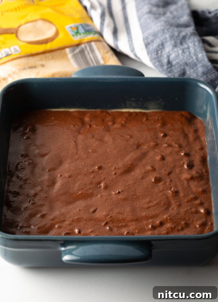 Decadent Chocolate Pudding Cake 5 Chocolate cake batter in a pan.