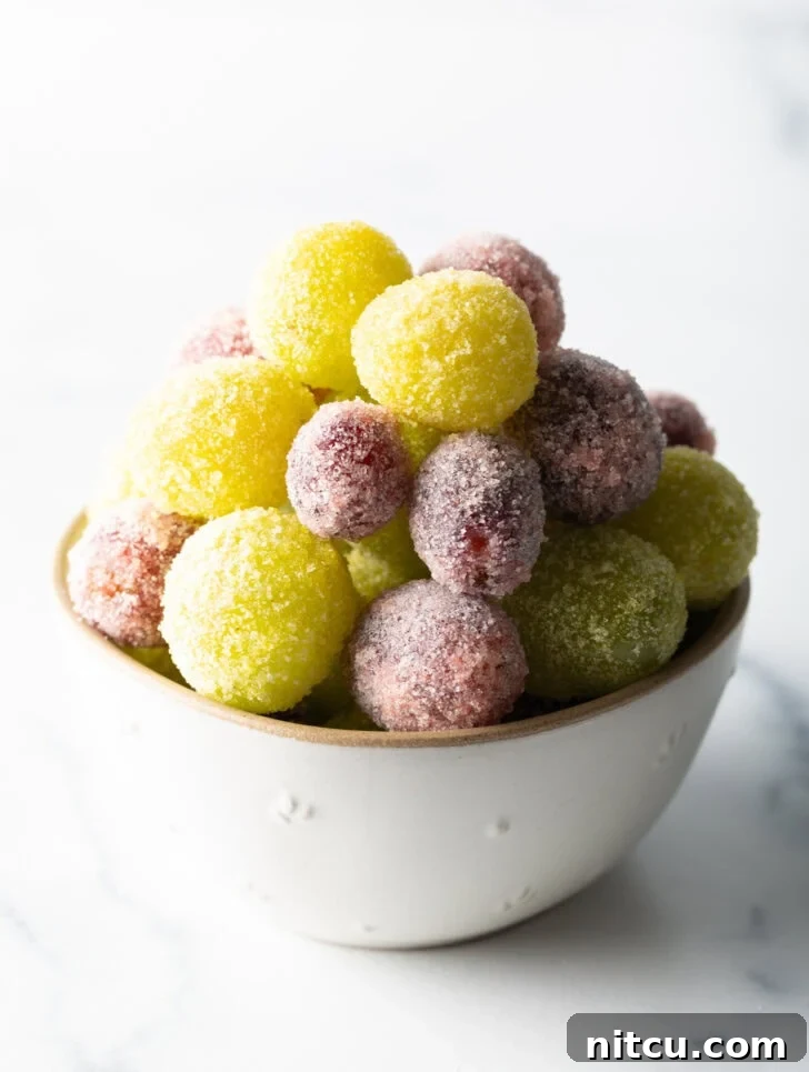 Sweet Grape Gems 5 A bowl of green and purple candy grapes.