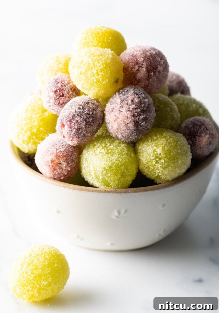 Sweet Grape Gems 9 A bowl of green and purple candy grapes.