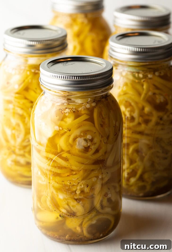 Sweet and Tangy Pickled Banana Peppers 3 4 large sealed jars of canned pickled banana peppers
