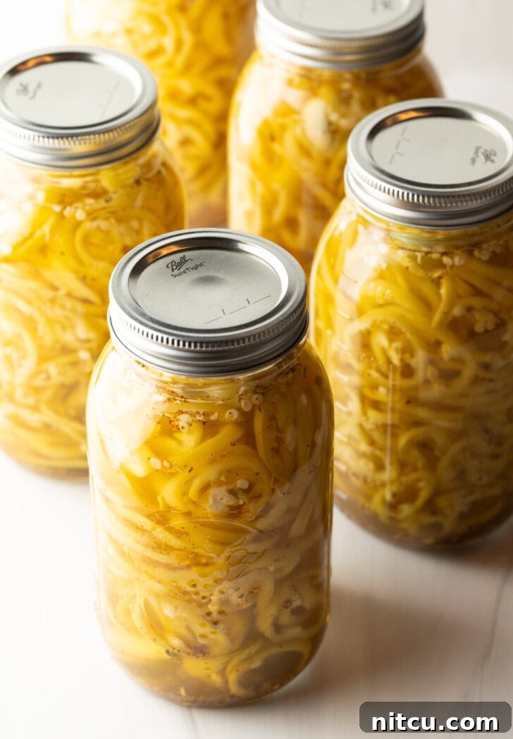 Sweet and Tangy Pickled Banana Peppers 9 4 large sealed jars of canned pickled banana peppers.
