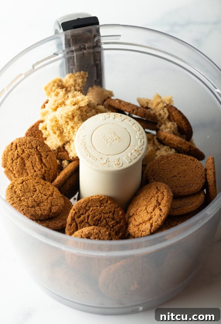 Sheet Pan No-Bake Pumpkin Cheesecake 5 Whole gingersnap cookies in a food processor.
