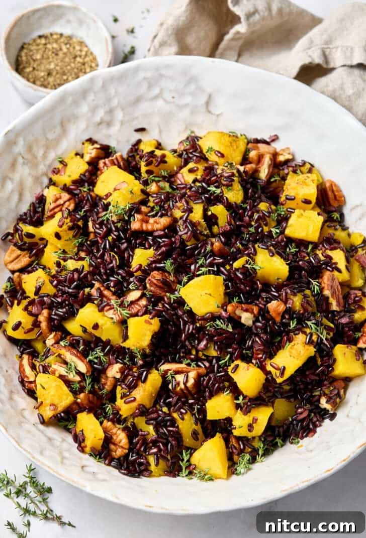 Royal Purple Rice Dish 2 Black Rice Recipe (Forbidden Rice) in large bowl, garnished with herbs.