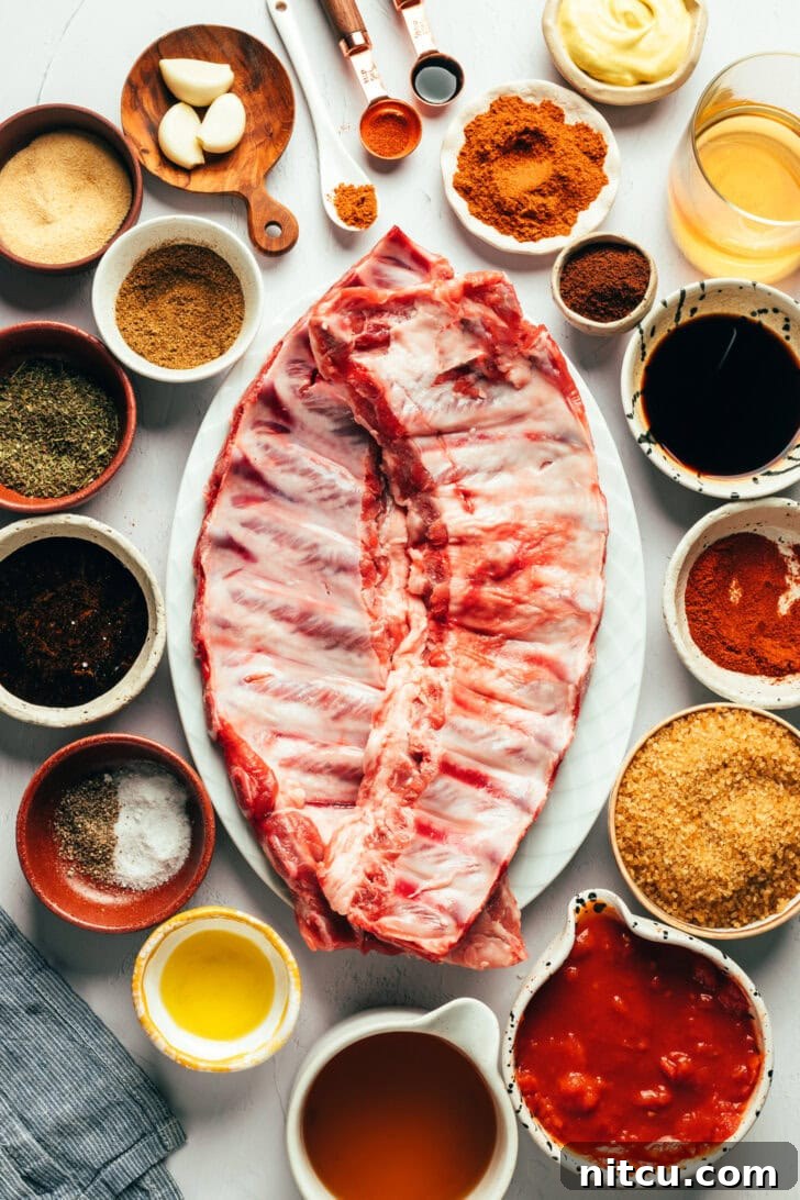 Fall-Off-The-Bone Oven Ribs 5 Ingredients for baby back ribs and coffee BBQ sauce arranged on a kitchen counter