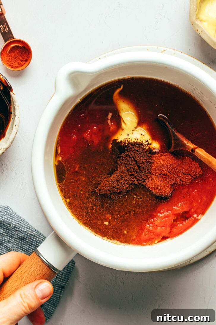 Fall-Off-The-Bone Oven Ribs 8 Chef preparing homemade coffee barbecue sauce in a saucepan