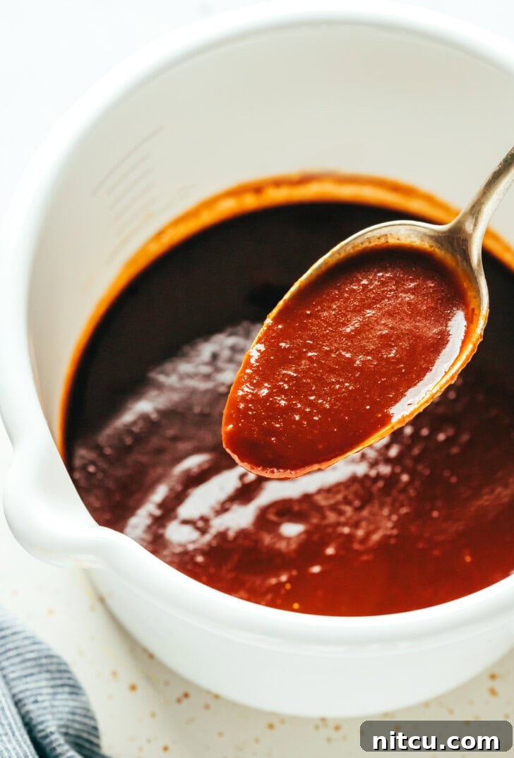Fall-Off-The-Bone Oven Ribs 9 Rich, homemade coffee barbecue sauce simmering in a saucepan