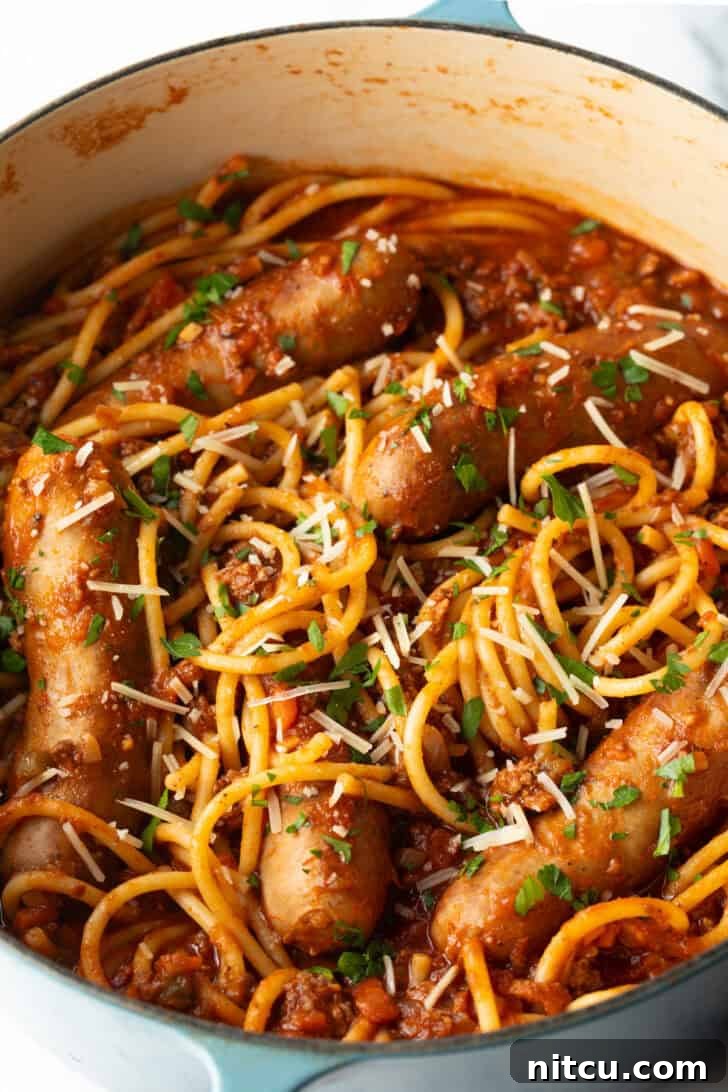 Slow-Simmered Sunday Meat Sauce 10 Top down one pot of spaghetti, sausage, and tomato sauce.