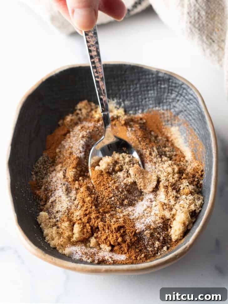 Signature Pork Chop Seasoning 7 Close-up of chili powder and other spices in a bowl.