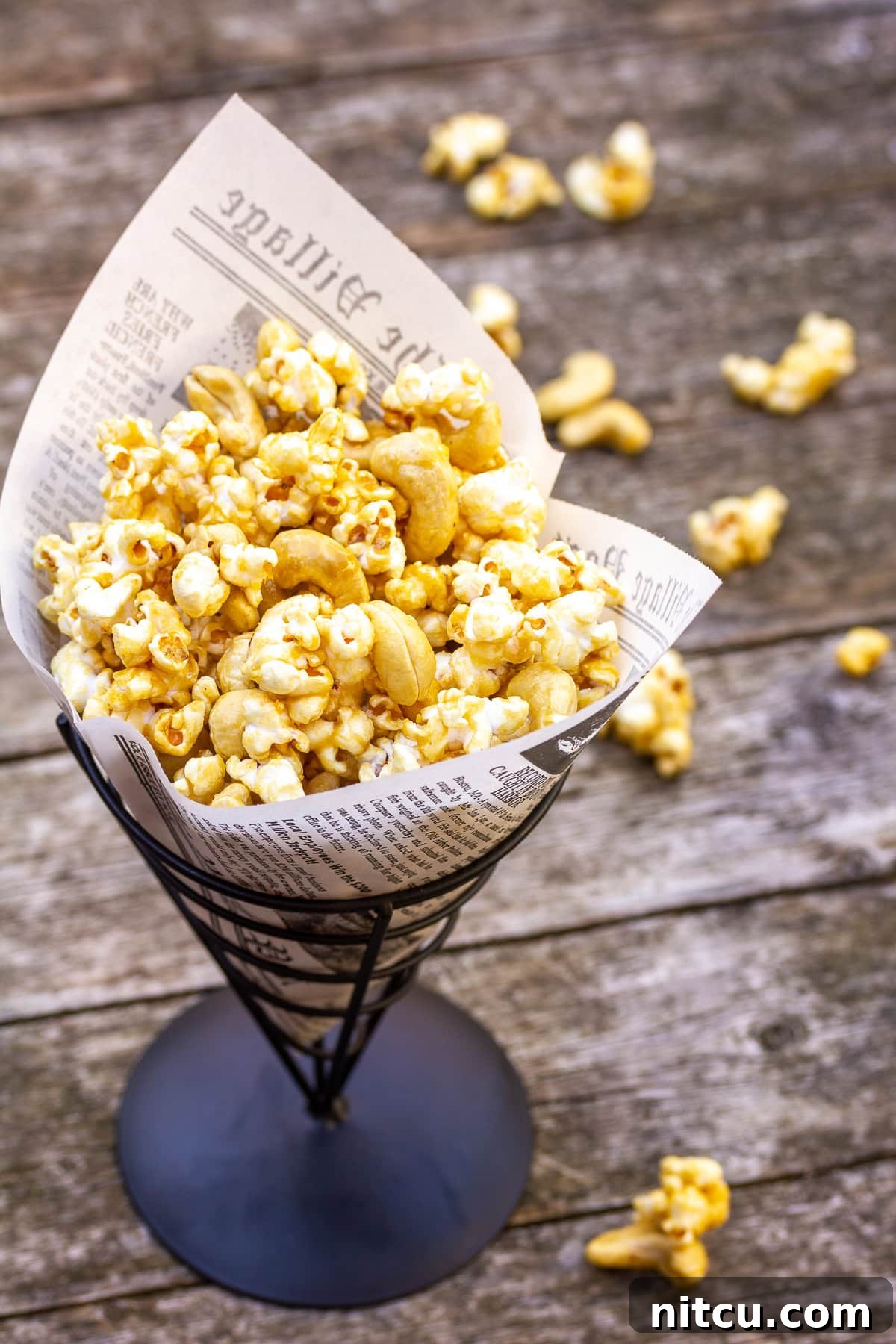 Easy Popcorn Recipes An array of delicious easy popcorn recipes, featuring the microwave caramel corn with cashews, highlighting its versatility as a snack.