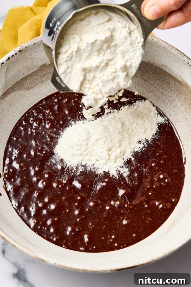 Fiesta Crinkle Cookies 4 Mocha Crinkle Cookies - making cookie dough in large mixing bowl with electric mixer.