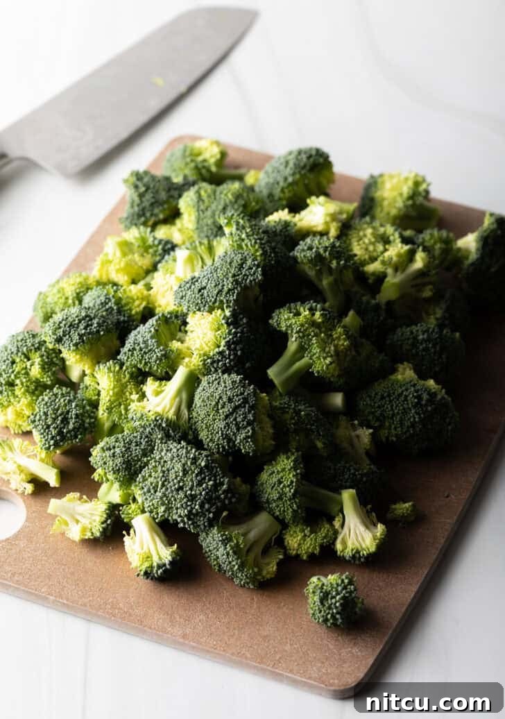 Achieve Perfectly Tender Broccoli Every Time 4 How to boil broccoli to add to other recipe - cutting broccoli into florets.